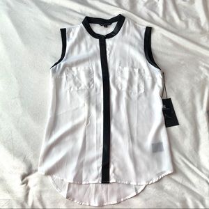 Sleeveless White Blouse with Faux Leather